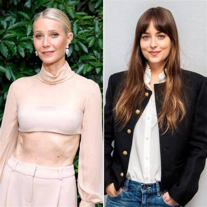 Dakota Johnson, 29, holds hands with younger sister Grace, 19, as they