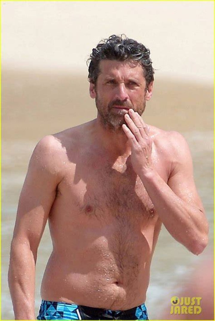 Shirtless Patrick Dempsey Continues His Beach Vacation with Wife